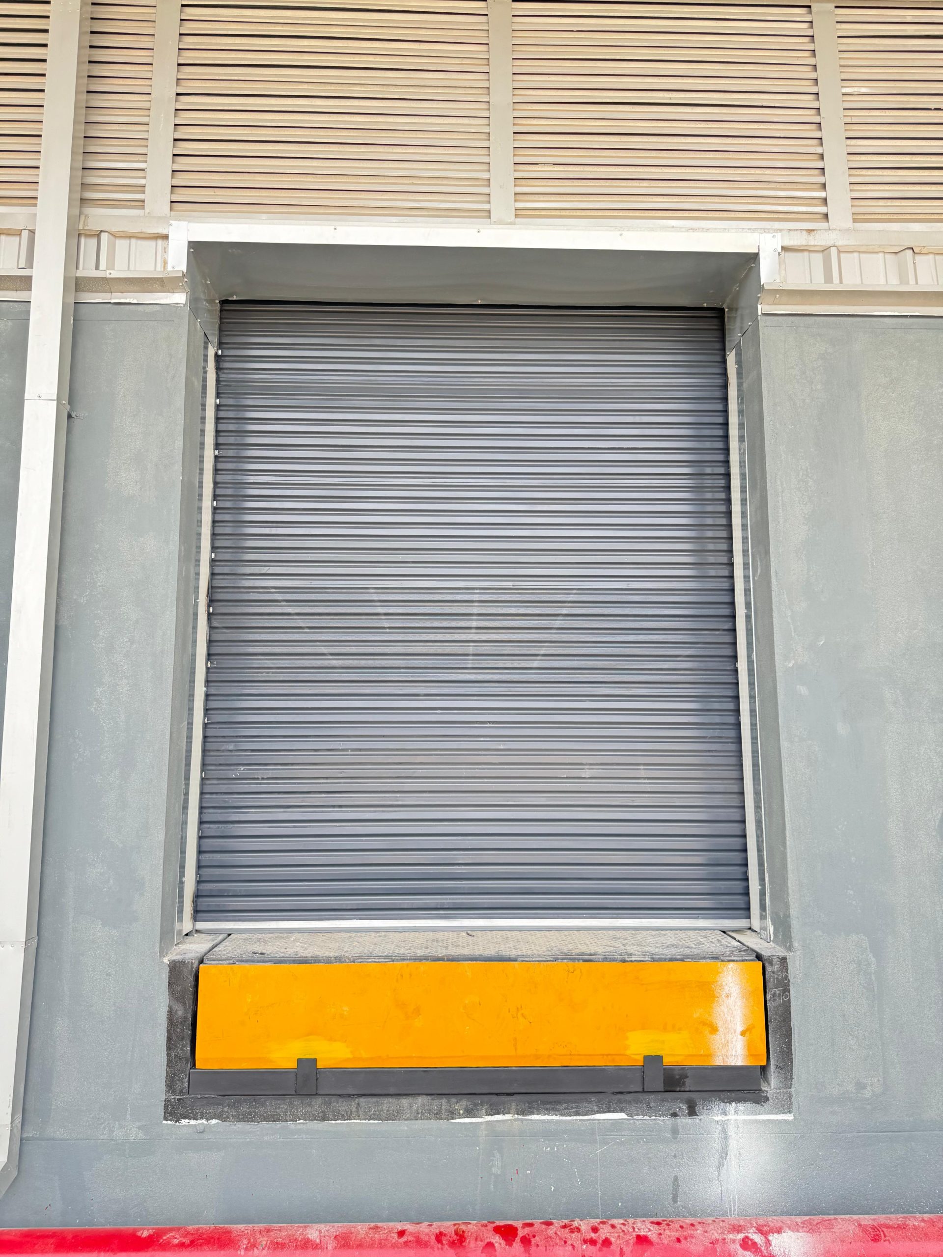 Dock leveller installed at an industrial loading bay
