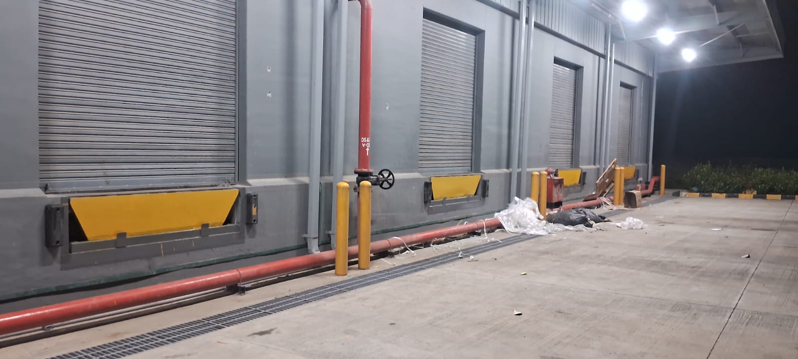 Edge dock levellers installed along a loading area