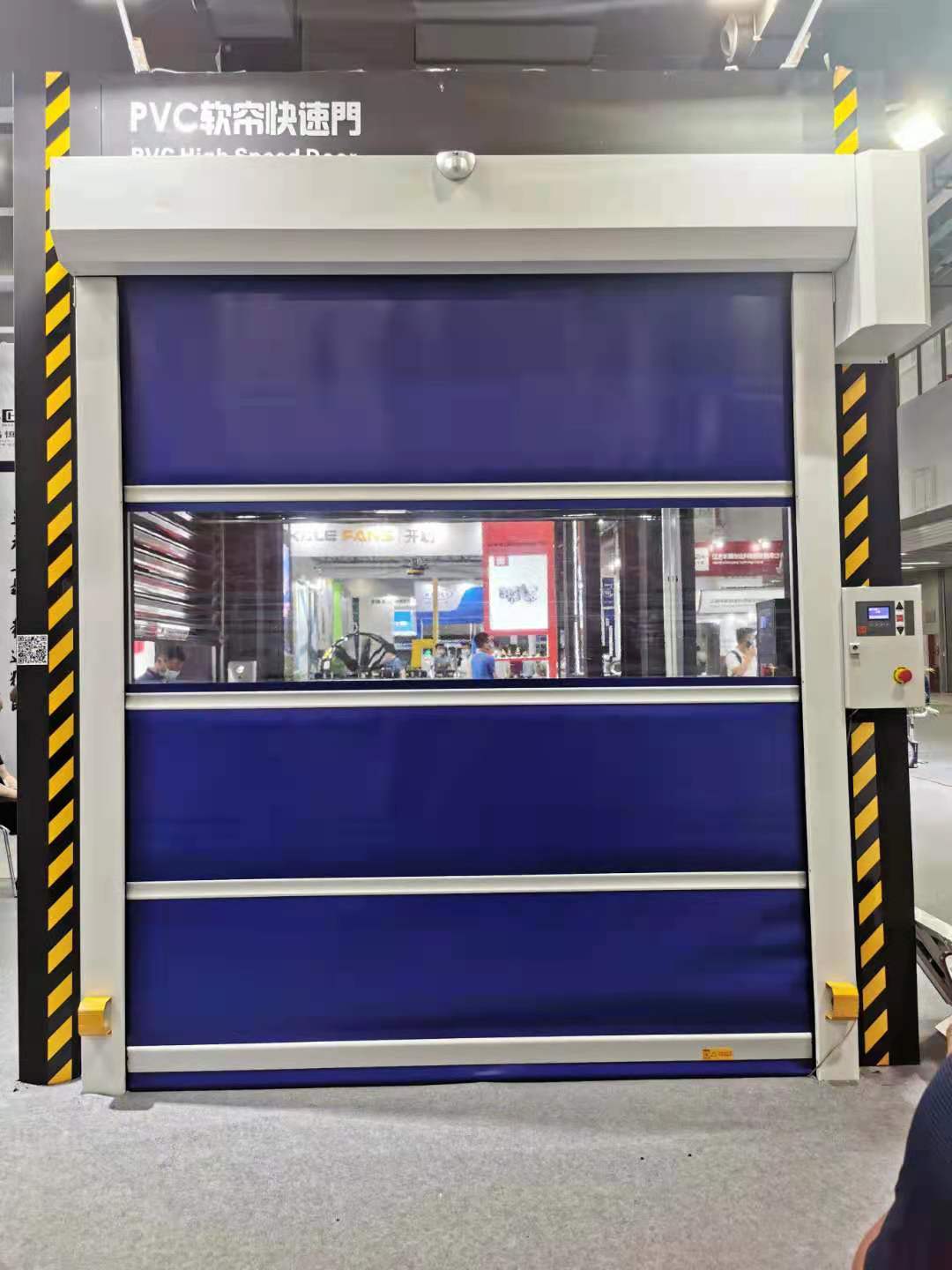 Blue PVC high speed door with safety controls